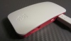 Photo of the server enclosure, white top and pink base - 368KB
